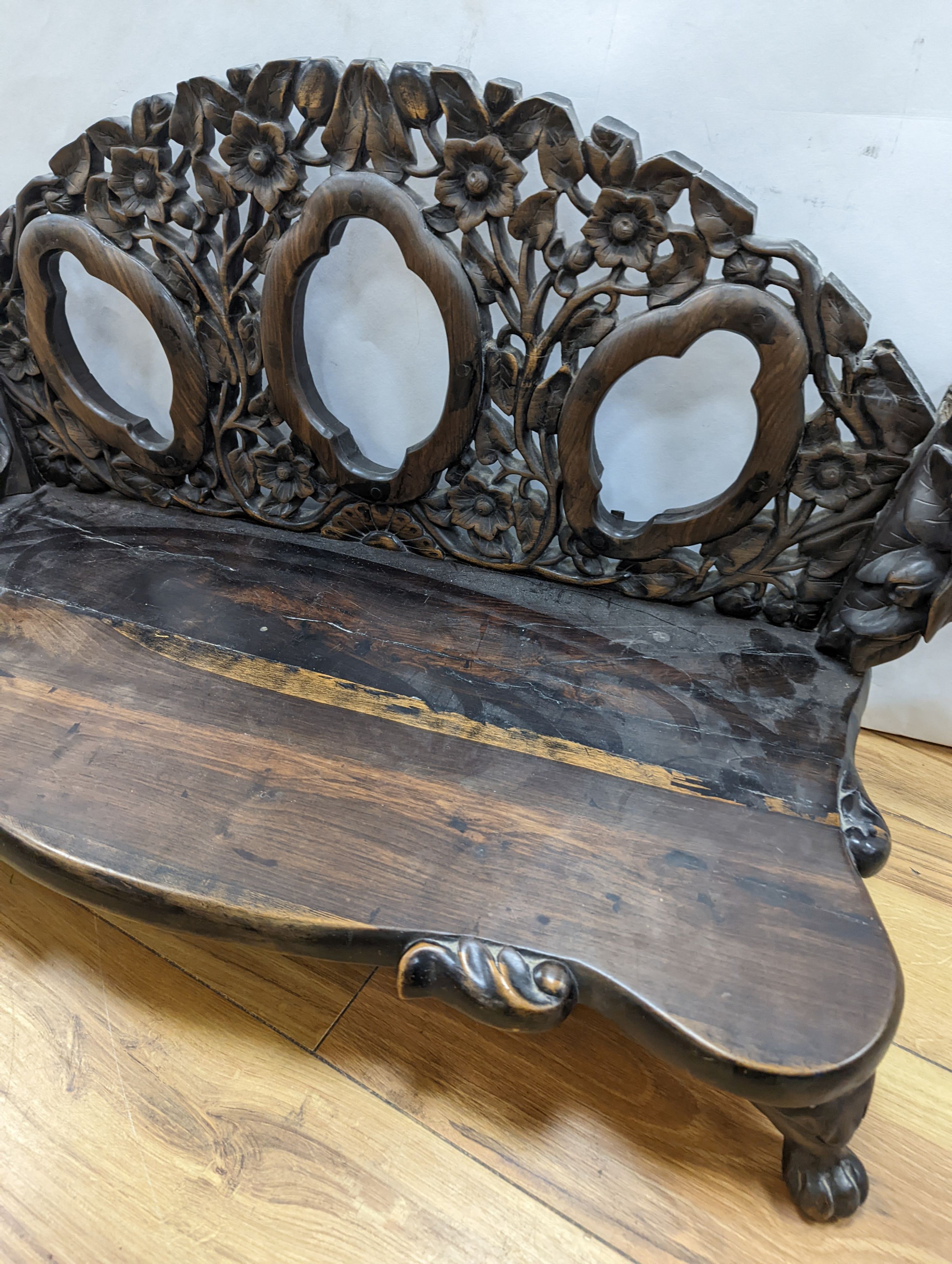 An early 20th century Chinese carved hardwood stand 85cm wide